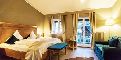Wellnessurlaub - Hotel-Schwerpunkt: Wellness & Golf - Zimmer_Deluxe - Landgasthof Karner