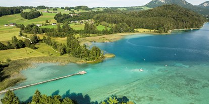 Wellnessurlaub - Schorn - Blick auf den kristallblauen Fuschlsee - Arabella Jagdhof Resort am Fuschlsee