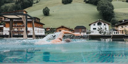 Wellnessurlaub - Pools: Infinity Pool - Kaprun Fürth - Hotel Tauernhof 