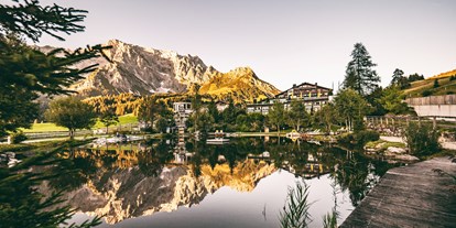 Wellnessurlaub - Rücken-Nacken-Massage - Ramsau am Dachstein - Hotel Ansicht - Übergossene Alm Resort