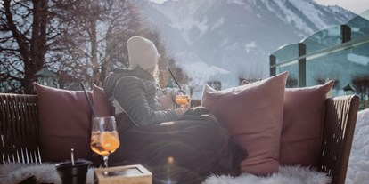 Wellnessurlaub - Kräutermassage - Erlfeld - ... die Aussicht auf die Bergwelt genießen - egal ob Sommer oder Winter - Hotel Berghof | St. Johann in Salzburg
