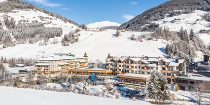 Wellnessurlaub - Aromasauna - Mühlen in Taufers - Außenansicht Winter  - Dolomiten Residenz Sporthotel Sillian