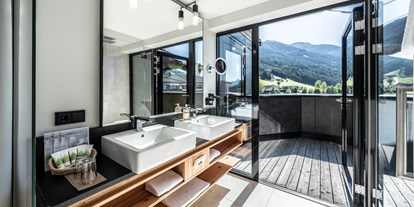 Wellnessurlaub - Außensauna - Tirol - Wohnbeispiel Premium Suite de Luxe  - Dolomiten Residenz Sporthotel Sillian