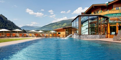 Wellnessurlaub - Umgebungsschwerpunkt: Berg - Kitzbühel - Außenpool - Ferienhotel Sonnenhof****