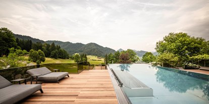 Wellnessurlaub - Lymphdrainagen Massage - Kitzbühel - Infinity Pool - Wohlfühlresort Peternhof 