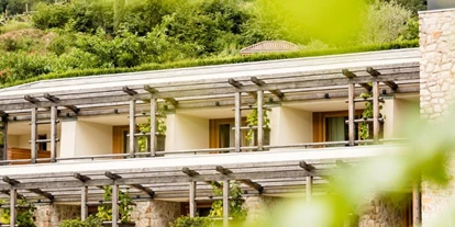 Wellnessurlaub - Hotel-Schwerpunkt: Wellness & Familie - Trentino-Südtirol - Hotel Hasslhof - Wohnen im Weinberg am Kalterer See