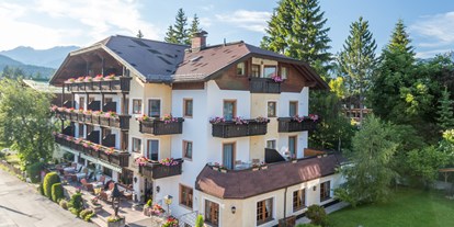 Wellnessurlaub - Kräutermassage - Bad Kohlgrub - Hotel Ansicht - Appart- und Wellnesshotel Charlotte Seefeld