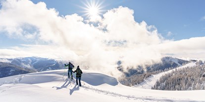 Wellnessurlaub - Großgörtschach - Schneeschuhwandern in den Kärntner Nockbergen - Hotel GUT Trattlerhof & Chalets****