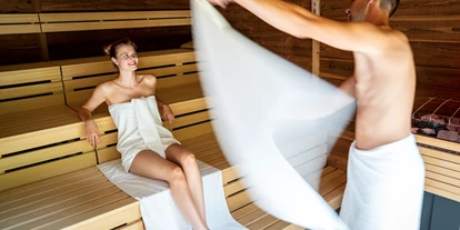 Wellnessurlaub - Shiatsu Massage - Görtschach (Millstatt am See) - Wöchentliche Saunaaufgüsse mit dem Saunameister - Hotel GUT Trattlerhof & Chalets****