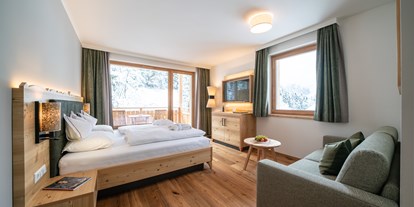 Wellnessurlaub - Honigmassage - Tschöran - Premium Familienzimmer - Hotel GUT Trattlerhof & Chalets****