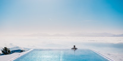 Wellnessurlaub - Rücken-Nacken-Massage - Braunitzen - 25 Meter langer Unendlichpool - Feuerberg Mountain Resort