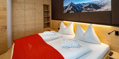 Wellnessurlaub - Bettgrößen: Doppelbett - Feld am See - Hotel Gartnerkofel