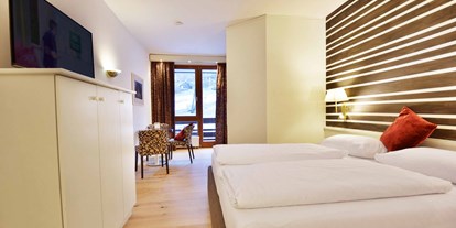 Wellnessurlaub - Umgebungsschwerpunkt: See - Tschöran - Familienzimmer - Hotel NockResort