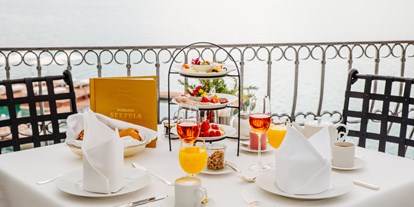 Wellnessurlaub - Großgörtschach - Schlossfrühstück auf unserer Sonnenterrasse - Hotel Schloss Seefels