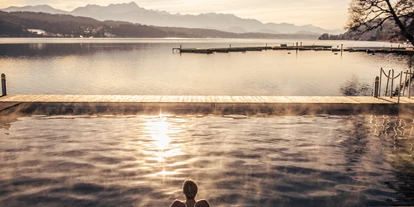 Wellnessurlaub - Shiatsu Massage - Görtschach (Millstatt am See) - Ein natürlicher Luxus - schwimmen im beheizten Seebad - Hotel Schloss Seefels