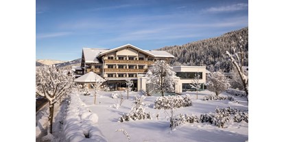 Wellnessurlaub - Pools: Außenpool nicht beheizt - Erlfeld - design & wellness Hotel Alpenhof ****S im Winter - Design & Wellness Hotel Alpenhof