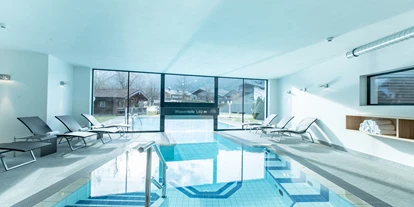 Wellnessurlaub - Bettgrößen: Queen Size Bett - Pron - Indoor- und Outdoor Pool (im Winter beheizt) - Design & Wellness Hotel Alpenhof