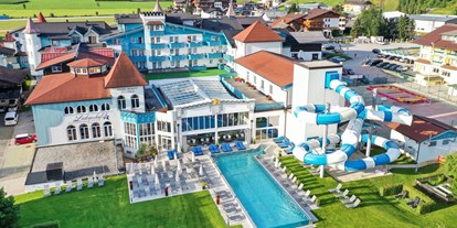 Wellnessurlaub - Pools: Sportbecken - PLZ 8972 (Österreich) - Schlosshotel Lacknerhof mit Schlossgarten und neuem Außenpool - Schlosshotel Lacknerhof****S