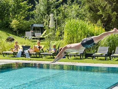 Wellnessurlaub - Außensauna - Strobl - Alpin Life Resort Lürzerhof