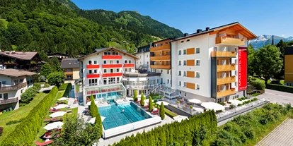 Wellnessurlaub - Pools: Außenpool beheizt - Schlaipf - Aussenansicht Sommer - Impuls Hotel Tirol
