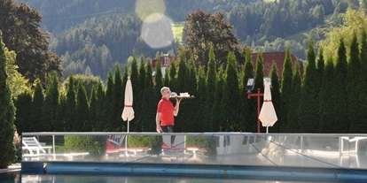 Wellnessurlaub - Ayurveda Massage - Schönau am Königssee Königssee - Außenpool - Impuls Hotel Tirol