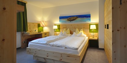 Wellnessurlaub - Rücken-Nacken-Massage - Seeboden - Doppelzimmer Tradition - Impuls Hotel Tirol