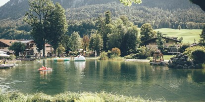 Wellnessurlaub - Pools: Schwimmteich - Bad Häring - Naturbadesee - POST Family Resort