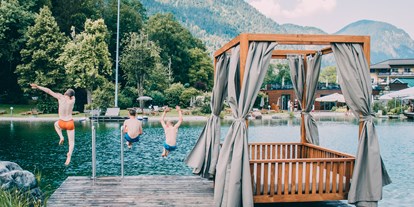 Wellnessurlaub - Pools: Schwimmteich - Kössen - Naturbadesee - POST Family Resort