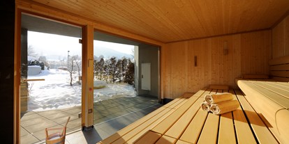 Wellnessurlaub - Umgebungsschwerpunkt: Berg - Kössen - Finnische Sauna mit Blick zum See - Ritzenhof****S - Hotel & Spa am See