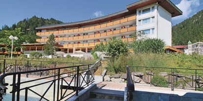 Wellnessurlaub - Pools: Außenpool beheizt - Ischgl - Außenansicht Alpenhotel Oberstdorf - Alpenhotel Oberstdorf