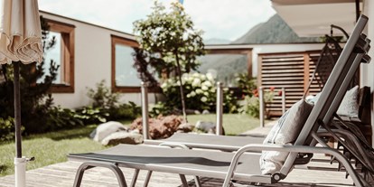 Wellnessurlaub - Pools: Innenpool - Gaißach - Kleiner, feiner Garten in unserem Wellnessbereich. - Hotel St. Georg zum See