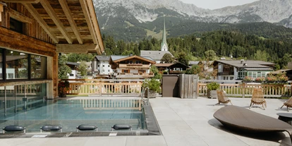 Wellnessurlaub - Pools: Schwimmteich - Grießen (Leogang) - Dachterrasse zum Entspannen - Kaiserlodge 