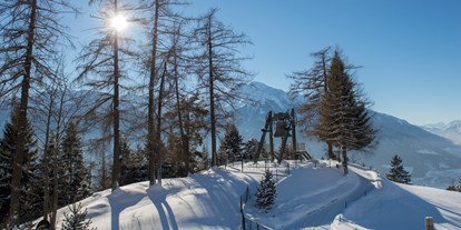 Wellnessurlaub - Ganzkörpermassage - Ladis - Die Friedensglocke im Alpenraum - bei uns im Garten - läutet täglich für den Frieden in den Alpenländern - Inntalerhof - DAS Panoramahotel