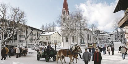 Wellnessurlaub - Verpflegung: Frühstück - Wallgau - Fußgängerzone Seefeld in Tirol - alpinen Lifestyle im Sommer wie im Winter genießen - Inntalerhof - DAS Panoramahotel