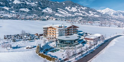 Wellnessurlaub - Außensauna - Tirol - Winter - Sport- und Wellnesshotel Held****s