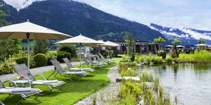 Wellnessurlaub - Pools: Außenpool beheizt - Achenkirch - Garten mit Bio-Schwimmteich - Sport- und Wellnesshotel Held****s