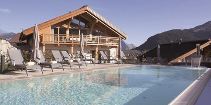 Wellnessurlaub - Ayurveda-Therapie - Garmisch-Partenkirchen - Außenpool - Mountains Hotel