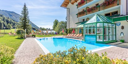 Wellnessurlaub - Hotel-Schwerpunkt: Wellness & Familie - Kössen Kranzach - Freibad - Vitalhotel Berghof