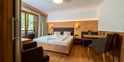 Wellnessurlaub - Hot Stone - Suite Pillersee mit kleinem Wohnteil - Wellness & Familienhotel Kitzspitz