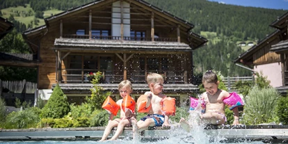 Wellnessurlaub - zustellbare Kinderbetten - Rodeneck - Post Alpina - Family Mountain Chalets