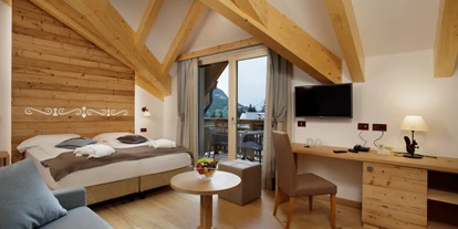 Wellnessurlaub - Verpflegung: Halbpension - Montagna - superior deluxe room - TEVINI - Dolomites Charming Hotel