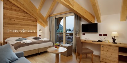 Wellnessurlaub - Preisniveau: gehoben - Madonna di Campiglio - superior deluxe room - TEVINI - Dolomites Charming Hotel