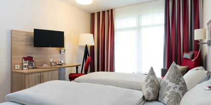 Wellnessurlaub - Bettgrößen: Queen Size Bett - Unterföhring - Zimmerbeispiel Premium - Hotel St. Georg