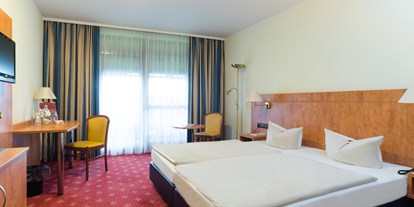 Wellnessurlaub - Bettgrößen: Queen Size Bett - Wörth (Erding) - Zimmerbeispiel Komfort - Hotel St. Georg