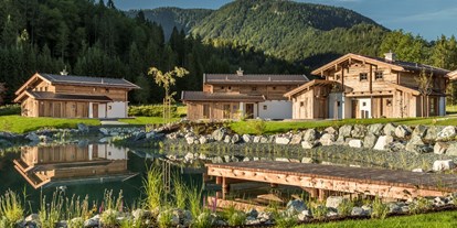 Wellnessurlaub - Preisniveau: gehoben - Oberbayern - Chaletdorf auf Gut Steinbach mit Naturschwimmteich - Gut Steinbach Hotel und Chalets