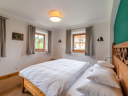 Wellnessurlaub - Bettgrößen: Doppelbett - Hinterglemm - Ein Schlafzimmer im Steinbacher Hof - Gut Steinbach Hotel und Chalets