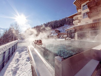 Wellnessurlaub - Hotelbar - 32° Outdoorpool - Alpin Family Resort Seetal****s