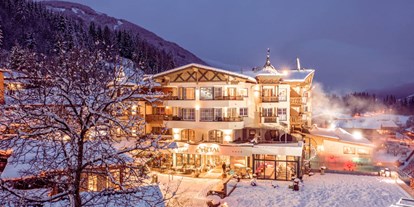 Wellnessurlaub - Hotel-Schwerpunkt: Wellness & Skifahren - Winter im Seetal direkt an der Talabfahrt - Alpin Family Resort Seetal****s