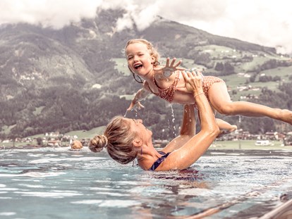 Wellnessurlaub - Pools: Außenpool beheizt - Alpin Family Resort Seetal****s