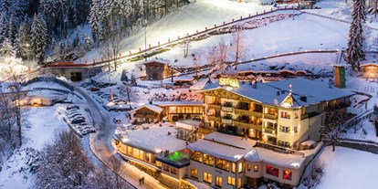 Wellnessurlaub - Hotelbar - Ski in Ski out - direkt an der Talabfahrt - Alpin Family Resort Seetal****s